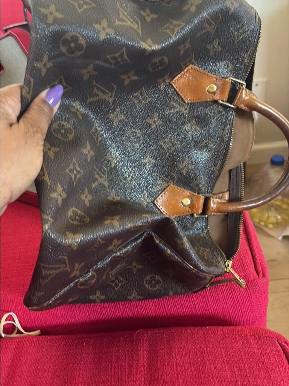 Louis Vuitton speedy 30 one side handle has been replaced